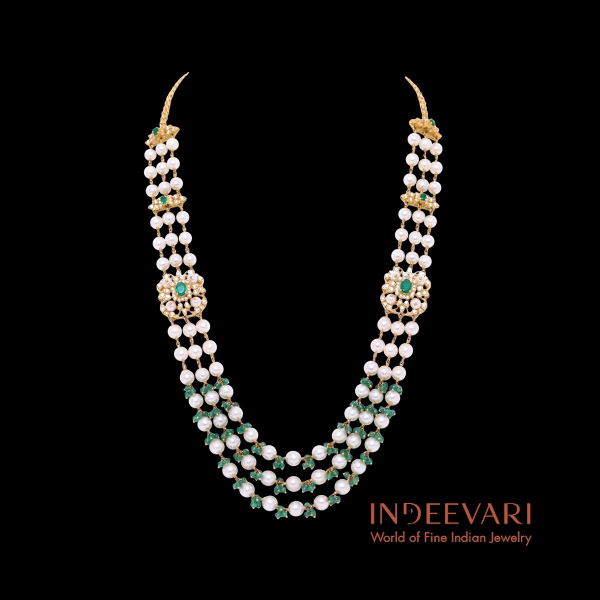 Royal Cascade Pearl and Emerald Necklace with four graduated strands and emerald panels in 18kt gold