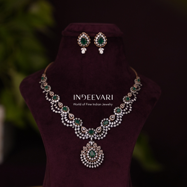 Cascading pear-cut green stone diamond necklace