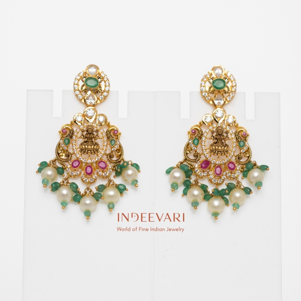 Ritvi Lakshmi hanging earrings with Lakshmi motif, cubic zirconia stones, emeralds, rubies, and pearls – traditional dangle earrings for festive wear