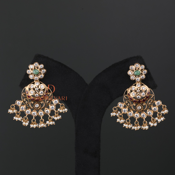 Aadhishri Ruby Emerald Chandbali earrings in gold with triple-step design, set with rubies, emeralds, CZ and pota stones, fringed with pearls – traditional Indian chandbali earrings