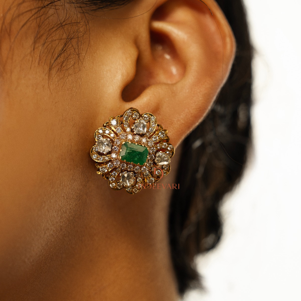 Elegant Triple-Cut Diamond Studs with Emerald Accents