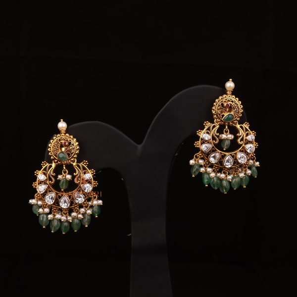 Drishti Pachiwork earrings with cubic zirconia stones, emerald beads, and pearls – traditional Indian gold earrings with festive elegance