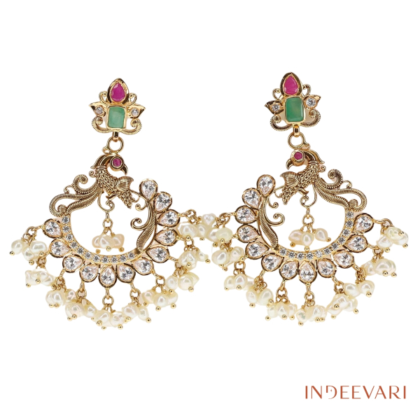 Mayurika Pachi Chandbali earrings with rubies, emeralds, pearls, and cubic zirconia – traditional Indian chand earrings in gold tone